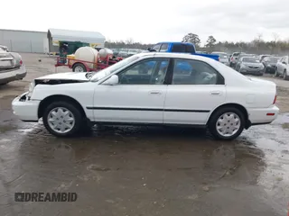 1996 Honda Accord LX with VIN 1HGCD5633TA266516, listed as a IAAI auction lot 41839684 with 162,523 mi miles and . Bid and sale history available at carsss.com. Image 13.