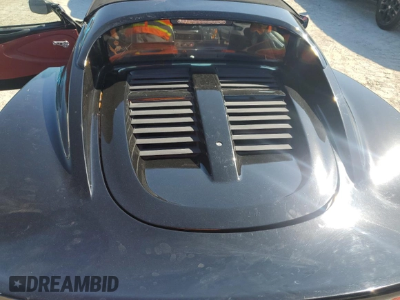 2006 Lotus Elise z VIN SCCPC11196HL30330, wystawiony jako Copart lot #77806924 z przebiegiem Nie podano mil oraz Szkody całkowita. Historia ofert i sprzedaży dostępna na DreamBid. Obrazek 11.