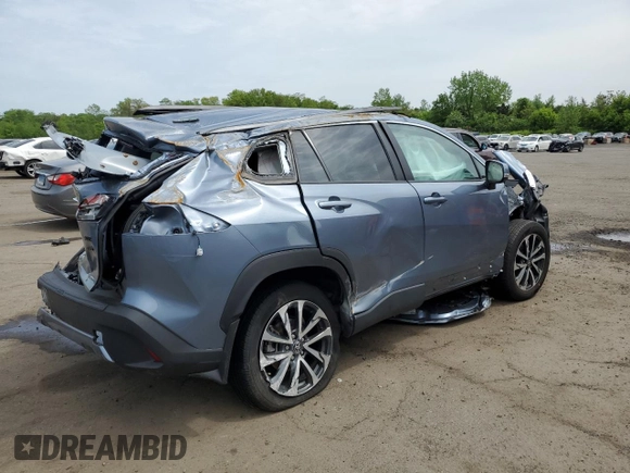 2023 Toyota Corolla Cross XLE with VIN 7MUDAABG4PV070998, listed as a Copart auction lot 56869585 with Not provided miles and Non repairable. Bid and sale history available at DreamBid. Image 3.