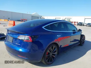2020 Tesla Model 3 Performance z VIN 5YJ3E1EC7LF641918, wystawiony jako IAAI lot #41984261 z przebiegiem 50 202 mil mil oraz . Historia ofert i sprzedaży dostępna na DreamBid. Obrazek 4.