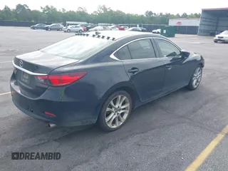 2015 Mazda 6 i Touring with VIN JM1GJ1V50F1194196, listed as a IAAI auction lot 42053615 with 173,724 mi miles. Bid and sale history available at carsss.com. Image 4.