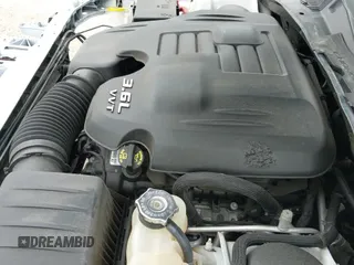2020 Dodge Charger SXT with VIN 2C3CDXJGXLH133648, listed as a IAAI auction lot 42293268 with 47,058 mi miles and . Bid and sale history available at DreamBid. Image 20.