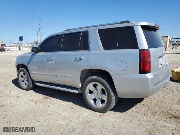 2015 Chevrolet Tahoe LTZ with VIN 1GNSCCKC3FR275902, listed as a Copart auction lot 49381535 with 134,883 mi miles and Salvage Title. Bid and sale history available at carsss.com. Image 2.