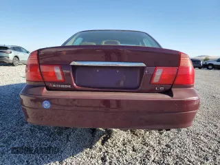 1998 Mitsubishi Diamante LS z VIN 6MMAP57P9WT007574, wystawiony jako Copart lot #85813234 z przebiegiem 134 695 mil mil oraz Szkody całkowita. Historia ofert i sprzedaży dostępna na DreamBid. Obrazek 6.