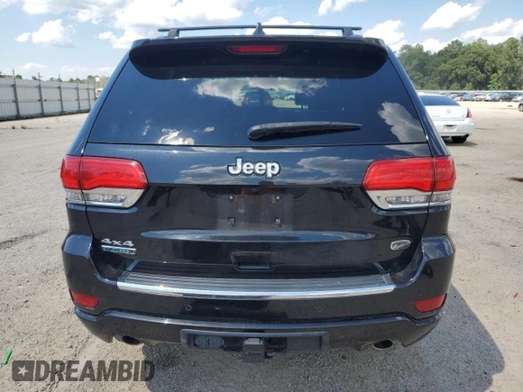 2016 Jeep Grand Cherokee Overland with VIN 1C4RJFCM9GC302353, listed as a Copart auction lot 58789604 with 87,826 mi miles and Clean title. Bid and sale history available at DreamBid. Image 6.