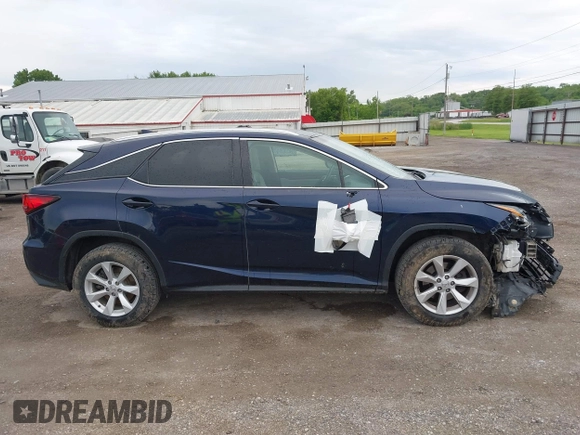2016 Lexus RX 350 with VIN 2T2BZMCA1GC012079, listed as a IAAI auction lot 42265304 with 124,861 mi miles and . Bid and sale history available at DreamBid. Image 13.