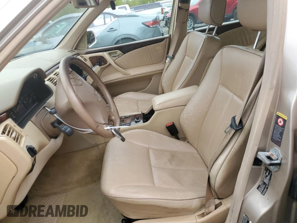 2001 Mercedes-Benz E-Class with VIN WDBJF65J51B378052, listed as a Copart auction lot 55057915 with 228,896 mi miles and Salvage Title. Bid and sale history available at carsss.com. Image 7.