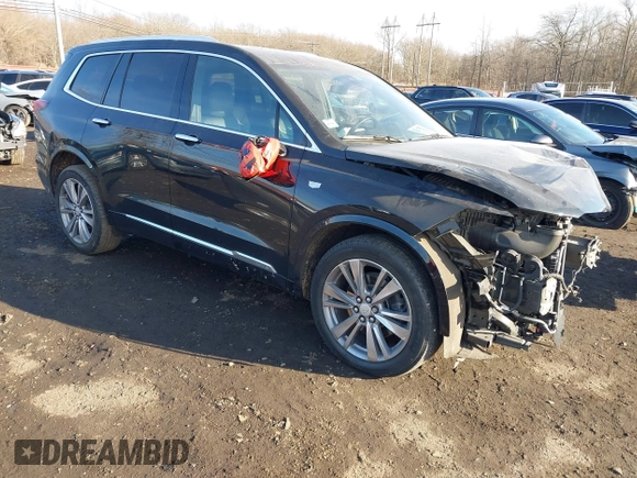 2023 Cadillac XT6 FWD Premium Luxury with VIN 1GYKPCRS1PZ105964, listed as a IAAI auction lot 41525039 with 70,603 mi miles and . Bid and sale history available at DreamBid. Image 1.