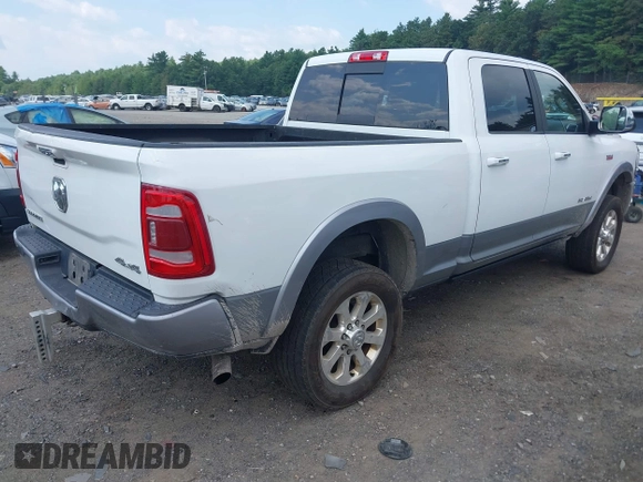 2020 Ram 2500 Laramie with VIN 3C6UR5FJ3LG141592, listed as a IAAI auction lot 42777818 with 194,980 mi miles and . Bid and sale history available at DreamBid. Image 4.