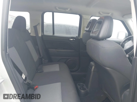 2009 Jeep Patriot Sport z VIN 1J4FT28A29D126757, wystawiony jako IAAI lot #42353541 z przebiegiem 122 277 mil mil oraz . Historia ofert i sprzedaży dostępna na DreamBid. Obrazek 8.