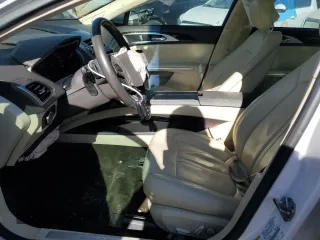 2015 Lincoln MKZ z VIN 3LN6L2GK8FR627120, wystawiony jako Copart lot #45954315 z przebiegiem 103 930 mil mil oraz Szkoda całkowita • Salvage title. Historia ofert i sprzedaży dostępna na DreamBid. Obrazek 7.