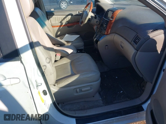2006 Toyota Sienna XLE z VIN 5TDBA22C16S072064, wystawiony jako IAAI lot #41669738 z przebiegiem 201 678 mil mil oraz . Historia ofert i sprzedaży dostępna na DreamBid. Obrazek 5.