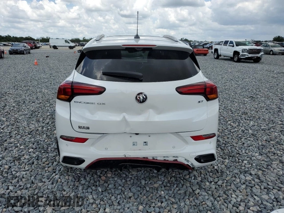 2021 Buick Encore GX Essence z VIN KL4MMFSL3MB145909, wystawiony jako Copart lot #59030565 z przebiegiem 9 279 mil mil oraz Nie do naprawy • Non repairable. Historia ofert i sprzedaży dostępna na DreamBid. Obrazek 6.