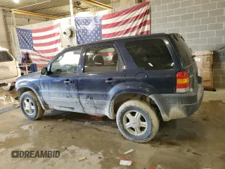 2004 Ford Escape XLS with VIN 1FMYU92154KA14600, listed as a Copart auction lot 83101474 with 305,444 mi miles and Salvage Title. Bid and sale history available at DreamBid. Image 2.