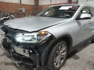 2020 BMW X2 xDrive28i with VIN WBXYJ1C09L5P35894, listed as a IAAI auction lot 41588426 with 24,476 mi miles. Bid and sale history available at carsss.com. Image 19.