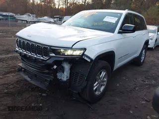 2023 Jeep Grand Cherokee Laredo with VIN 1C4RJHAG1PC530436, listed as a IAAI auction lot 40766475 with 12,535 mi miles and . Bid and sale history available at DreamBid. Image 18.