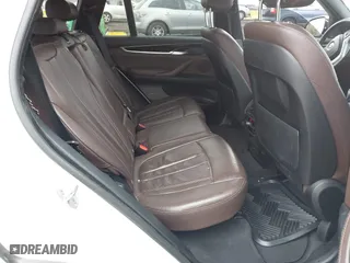 2018 BMW X5 xDrive35i with VIN 5UXKR0C58J0Y05234, listed as a IAAI auction lot 41957904 with 125,658 mi miles. Bid and sale history available at carsss.com. Image 8.