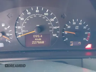 2001 Mercedes-Benz E-Class with VIN WDBJF65J81B215945, listed as a IAAI auction lot 41707410 with 227,668 mi miles. Bid and sale history available at carsss.com. Image 7.