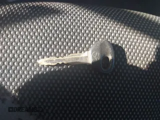 2003 Mazda MX-5 Miata Cloth z VIN JM1NB353730312566, wystawiony jako IAAI lot #41782864 z przebiegiem Nie podano mil oraz . Historia ofert i sprzedaży dostępna na DreamBid. Obrazek 11.