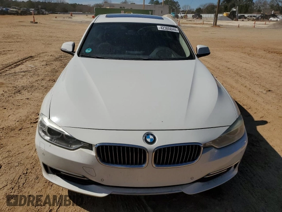 2012 BMW 3 Series 335i z VIN WBA3A9C5XCF270499, wystawiony jako Copart lot #73593204 z przebiegiem 121 602 mil mil oraz Szkoda całkowita • Salvage title. Historia ofert i sprzedaży dostępna na DreamBid. Obrazek 5.