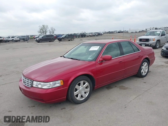2001 Cadillac Seville z VIN 1G8KS54Y91U227846, wystawiony jako IAAI lot #42134095 z przebiegiem 216 766 mil mil oraz . Historia ofert i sprzedaży dostępna na DreamBid. Obrazek 19.
