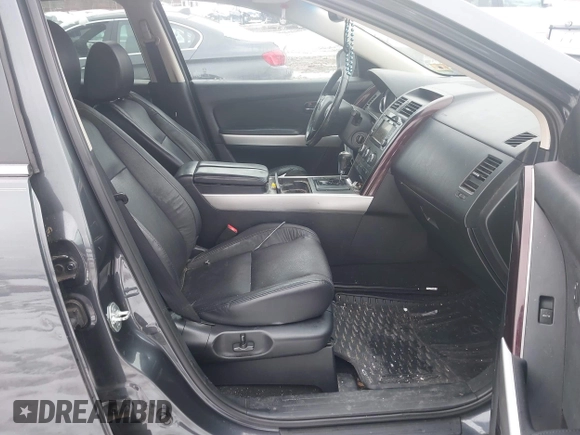 2014 Mazda CX-9 Grand Touring with VIN JM3TB3DV9E0440506, listed as a IAAI auction lot 41537718 with 217,299 mi miles and . Bid and sale history available at DreamBid. Image 5.