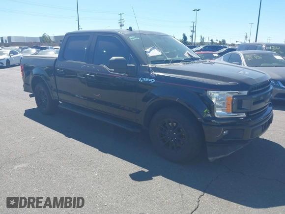 2019 Ford F-150 XL with VIN 1FTEW1CP9KKD28429, listed as a IAAI auction lot 41397905 with 96,793 mi miles and . Bid and sale history available at carsss.com. Image 1.