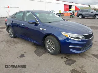 2016 Kia Optima LX Turbo with VIN 5XXGT4L11GG006576, listed as a IAAI auction lot 41666504 with 87,257 mi miles. Bid and sale history available at carsss.com. Image 1.
