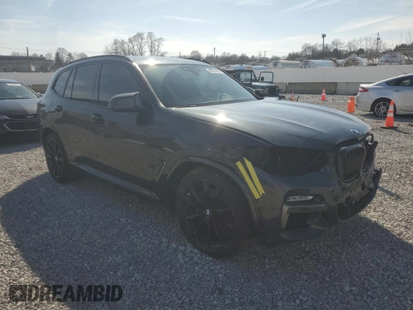2019 BMW X3 M40i with VIN 5UXTS3C58K0Z10478, listed as a Copart auction lot 49874785 with 60,944 mi miles and Salvage Title. Bid and sale history available at DreamBid. Image 4.