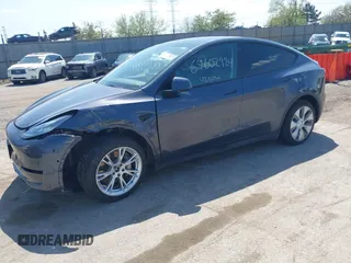 2022 Tesla Model Y Long Range with VIN 7SAYGDEE3NA007737, listed as a IAAI auction lot 42128359 with 42,597 mi miles and . Bid and sale history available at carsss.com. Image 20.
