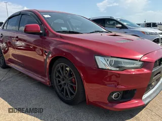 2012 Mitsubishi Lancer Evolution GSR z VIN JA32W8FV0CU019216, wystawiony jako Copart lot #75898944 z przebiegiem 129 387 mil mil oraz Tytuł czysty. Historia ofert i sprzedaży dostępna na DreamBid. Obrazek 1.