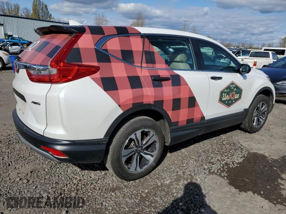 2019 Honda CR-V LX z VIN 5J6RW6H35KL004807, wystawiony jako Copart lot #51943275 z przebiegiem 119 862 mil mil oraz Szkoda całkowita • Salvage title. Historia ofert i sprzedaży dostępna na DreamBid. Obrazek 3.
