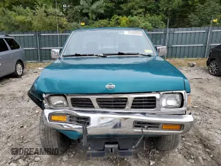 1997 Nissan Frontier XE with VIN 1N6SD16Y0VC329686, listed as a Copart auction lot 73103584 with 105,657 mi miles and Salvage title. Bid and sale history available at DreamBid. Image 5.