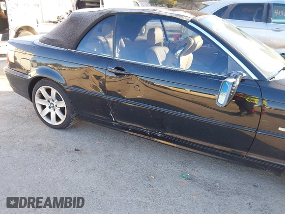 2002 BMW 3 Series 325Ci with VIN WBABS334X2JY59805, listed as a IAAI auction lot 41329486 with 163,893 mi miles and . Bid and sale history available at DreamBid. Image 6.