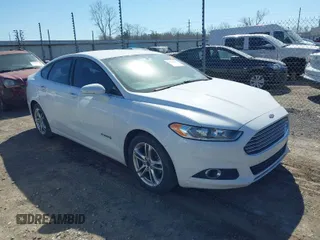 2016 Ford Fusion SE Hybrid with VIN 3FA6P0LU1GR127280, listed as a IAAI auction lot 41754682 with 194,357 mi miles. Bid and sale history available at carsss.com. Image 1.