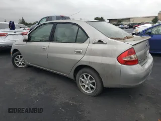 2003 Toyota Prius z VIN JT2BK18U430088533, wystawiony jako Copart lot #56091295 z przebiegiem 112 210 mil mil oraz Czysty tytuł • Clean title. Historia ofert i sprzedaży dostępna na DreamBid. Obrazek 2.