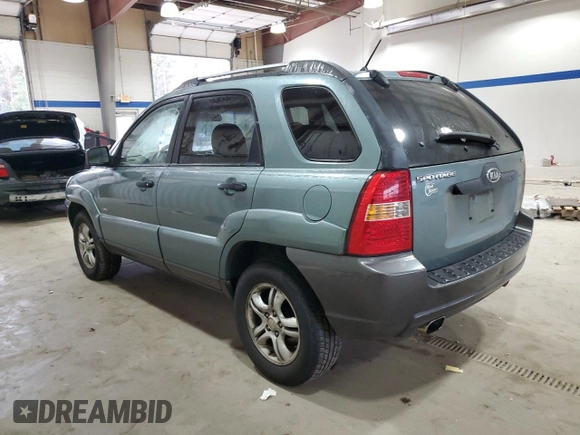 2005 Kia Sportage LX with VIN KNDJE723357136000, listed as a Copart auction lot 78710044 with 219,599 mi miles and Salvage Title. Bid and sale history available at carsss.com. Image 2.