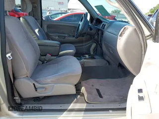 2001 Toyota Tacoma PreRunner z VIN 5TEGN92N41Z768370, wystawiony jako IAAI lot #42228571 z przebiegiem 172 317 mil mil oraz . Historia ofert i sprzedaży dostępna na DreamBid. Obrazek 5.