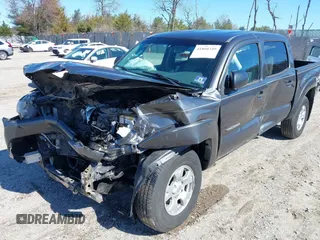 2015 Toyota Tacoma with VIN 3TMLU4EN0FM194841, listed as a IAAI auction lot 41860349 with 200,005 mi miles and . Bid and sale history available at DreamBid. Image 12.