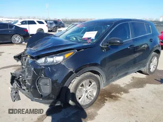 2019 Kia Sportage LX with VIN KNDPM3AC4K7534271, listed as a IAAI auction lot 41696261 with 71,386 mi miles. Bid and sale history available at carsss.com. Image 17.