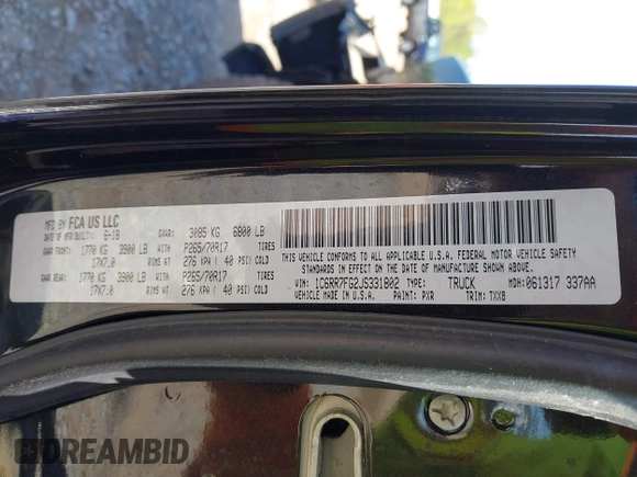 2018 Ram 1500 Express z VIN 1C6RR7FG2JS331802, wystawiony jako IAAI lot #41985617 z przebiegiem 68 483 mil mil oraz . Historia ofert i sprzedaży dostępna na DreamBid. Obrazek 9.