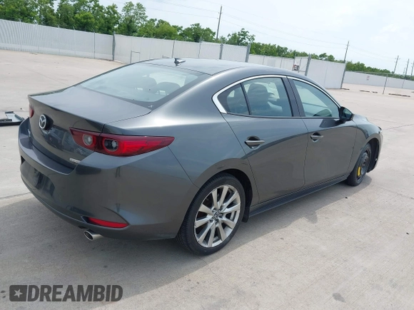 2023 Mazda 3 S Premium with VIN 3MZBPBDM3PM383238, listed as a IAAI auction lot 42477596 with 24,233 mi miles and . Bid and sale history available at DreamBid. Image 4.