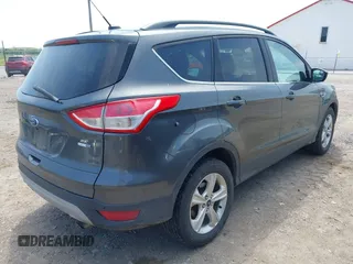 2016 Ford Escape SE with VIN 1FMCU9GX8GUB42944, listed as a IAAI auction lot 42171770 with 120,041 mi miles. Bid and sale history available at carsss.com. Image 4.
