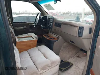 1997 GMC Savana with VIN 1GDFG15R6V1004277, listed as a IAAI auction lot 41462401 with 495,223 mi miles. Bid and sale history available at carsss.com. Image 5.