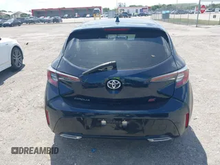 2019 Toyota Corolla Hatchback SE with VIN JTNK4RBE3K3061589, listed as a IAAI auction lot 42123273 with 90,491 mi miles. Bid and sale history available at carsss.com. Image 16.