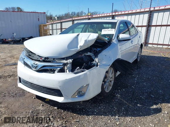 2014 Toyota Camry SE with VIN 4T1BK1FK2EU540026, listed as a IAAI auction lot 41678692 with 85,275 mi miles. Bid and sale history available at carsss.com. Image 16.