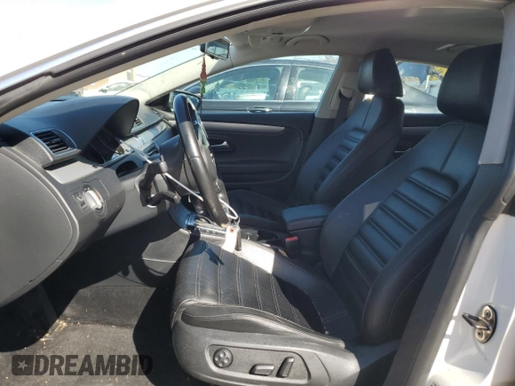 2012 Volkswagen CC Sport PZEV with VIN WVWMP7AN5CE521660, listed as a Copart auction lot 75190794 with 128,416 mi miles and Salvage Title. Bid and sale history available at carsss.com. Image 7.