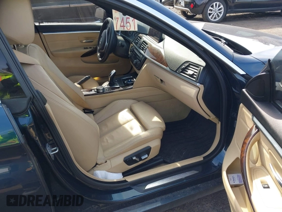 2016 BMW 4 Series 428i xDrive with VIN WBA4C9C56GG141089, listed as a IAAI auction lot 41587479 with 85,462 mi miles and . Bid and sale history available at DreamBid. Image 5.