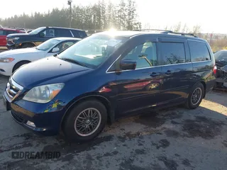 2006 Honda Odyssey TOURING with VIN 5FNRL38866B058344, listed as a IAAI auction lot 41298331 with 156,784 mi miles. Bid and sale history available at carsss.com. Image 2.