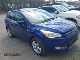 2014 Ford Escape SE with VIN 1FMCU9G93EUC54050, listed as a IAAI auction lot 42062980 with 129,015 mi miles. Bid and sale history available at carsss.com. Image 1.